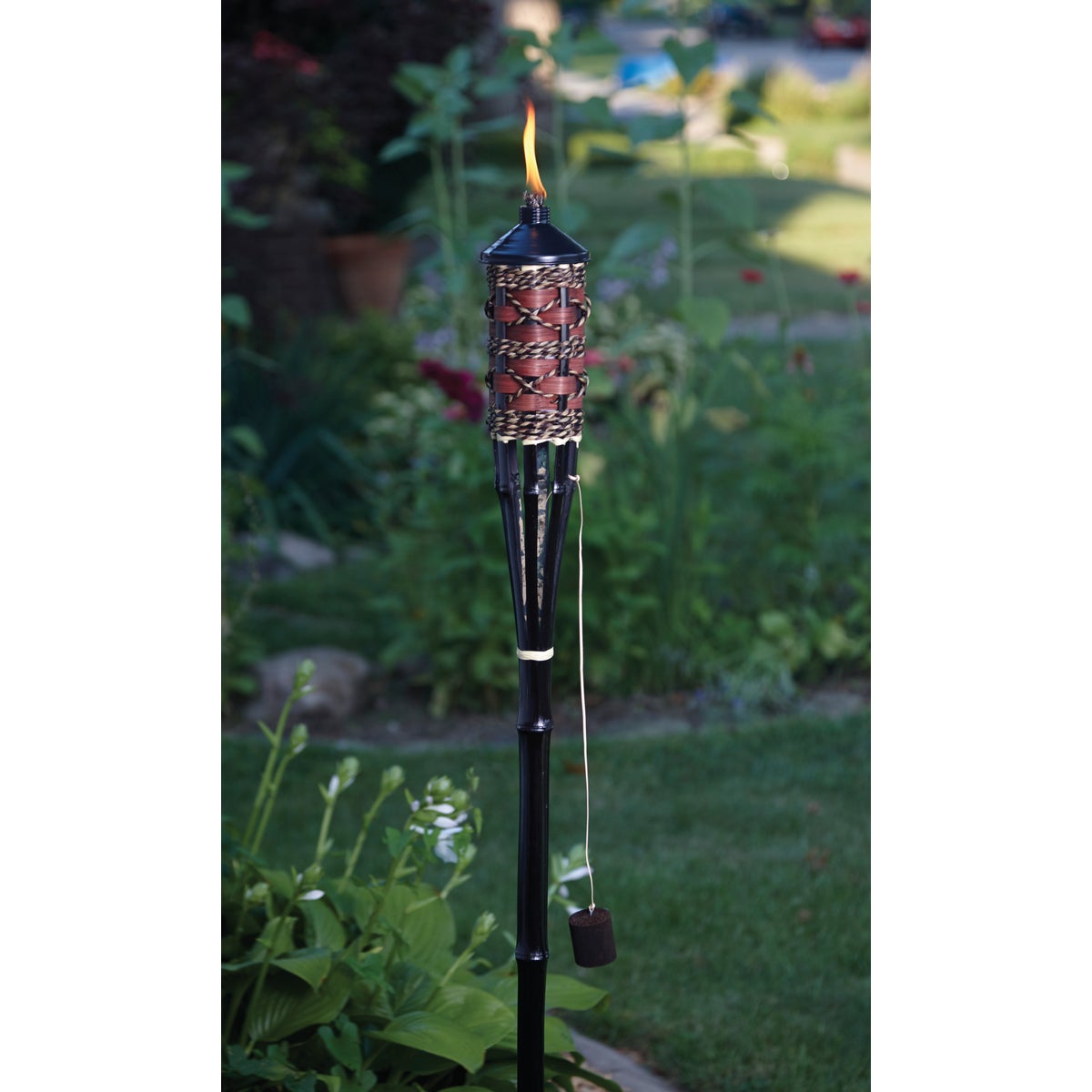 Outdoor Expressions 60 In. Brown Bamboo Patio Torch with Rattan Weave